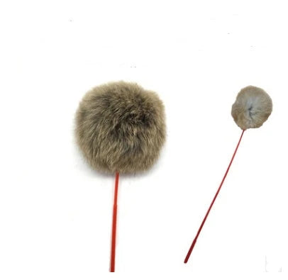 A handcrafted cat toy made from solid wood and natural materials, featuring a feather-on-a-stick design to captivate and engage your feline friend.