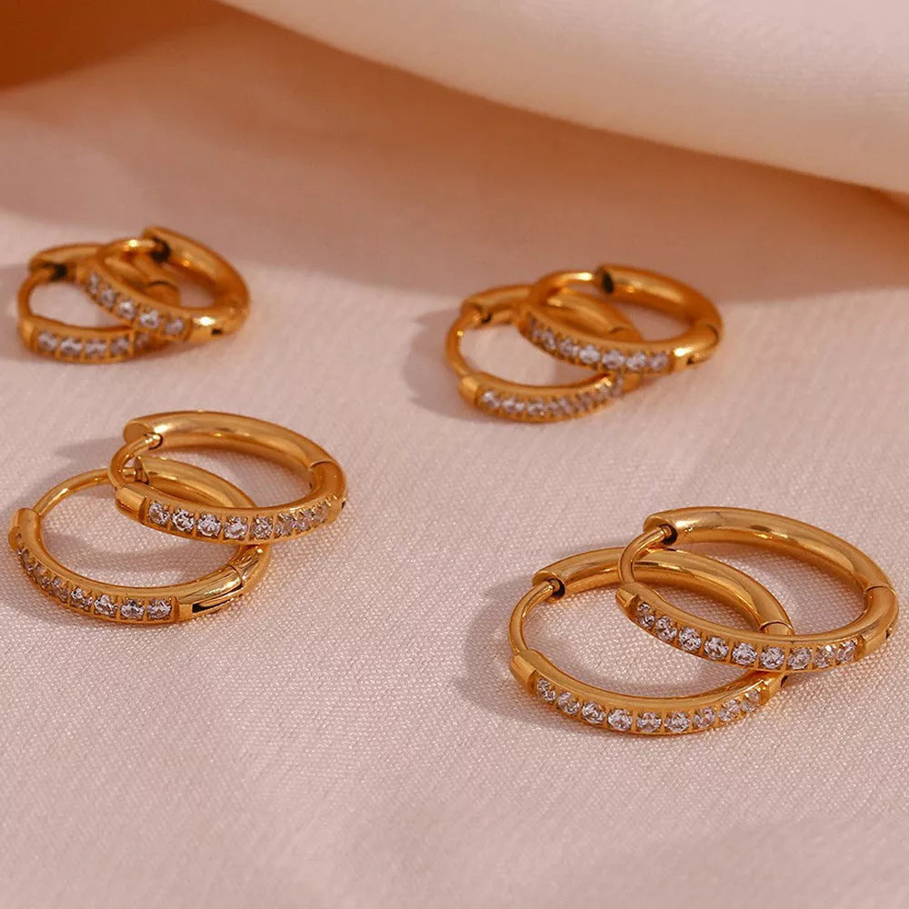 Women's titanium steel rounded edge zircon earrings in gold and steel finishes
