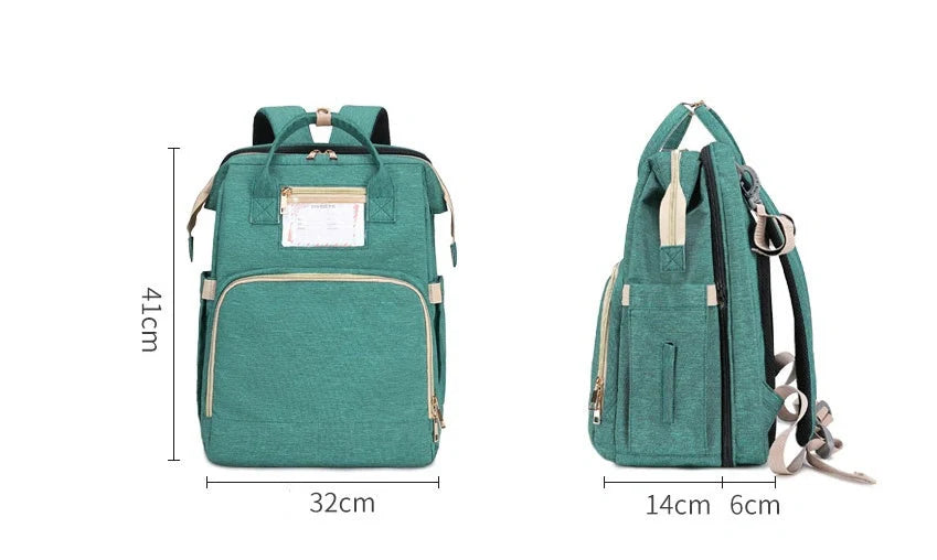 Portable folding crib and mummy bag in green and grey, compact design for baby travel