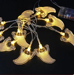 Spooktacular Halloween string lights with pumpkins, ghosts, and other festive decorations