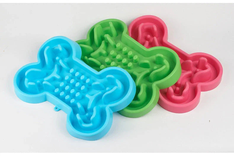 Slow feed pet bowl made of durable silicone, available in blue, rose red, and green colours, featuring anti-choke and anti-tip design for healthy digestion