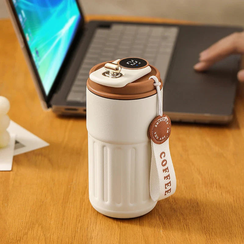 Stainless steel thermal bottle with digital temperature display, available in various colors and 450ml capacity