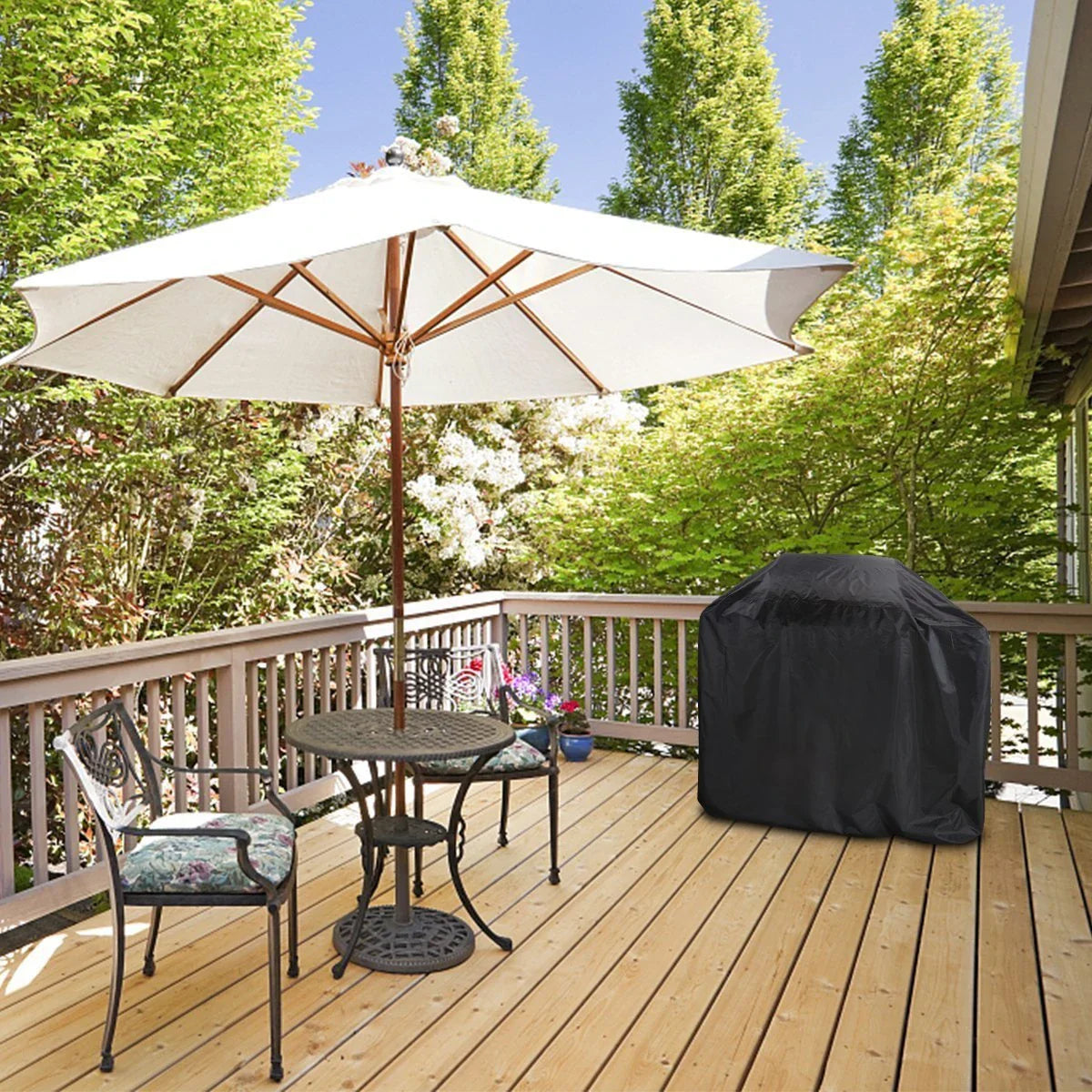 Premium outdoor grill cover made of durable 210D Oxford cloth with a silver coating to protect against weather and elements