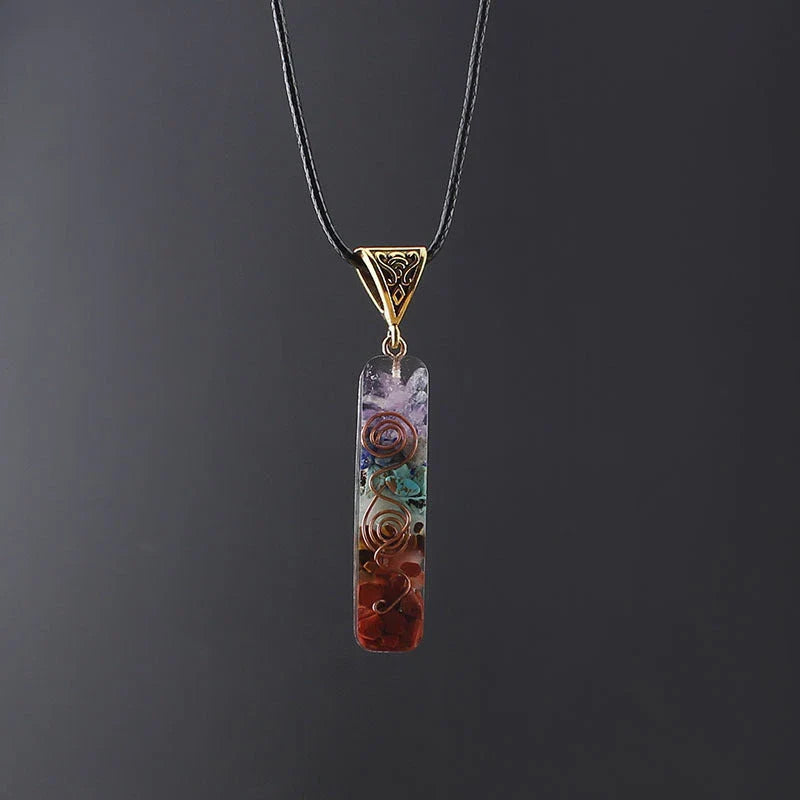 A stunning chakra crystal pendant with natural patterns and organic imperfections, showcasing the beauty of nature.
