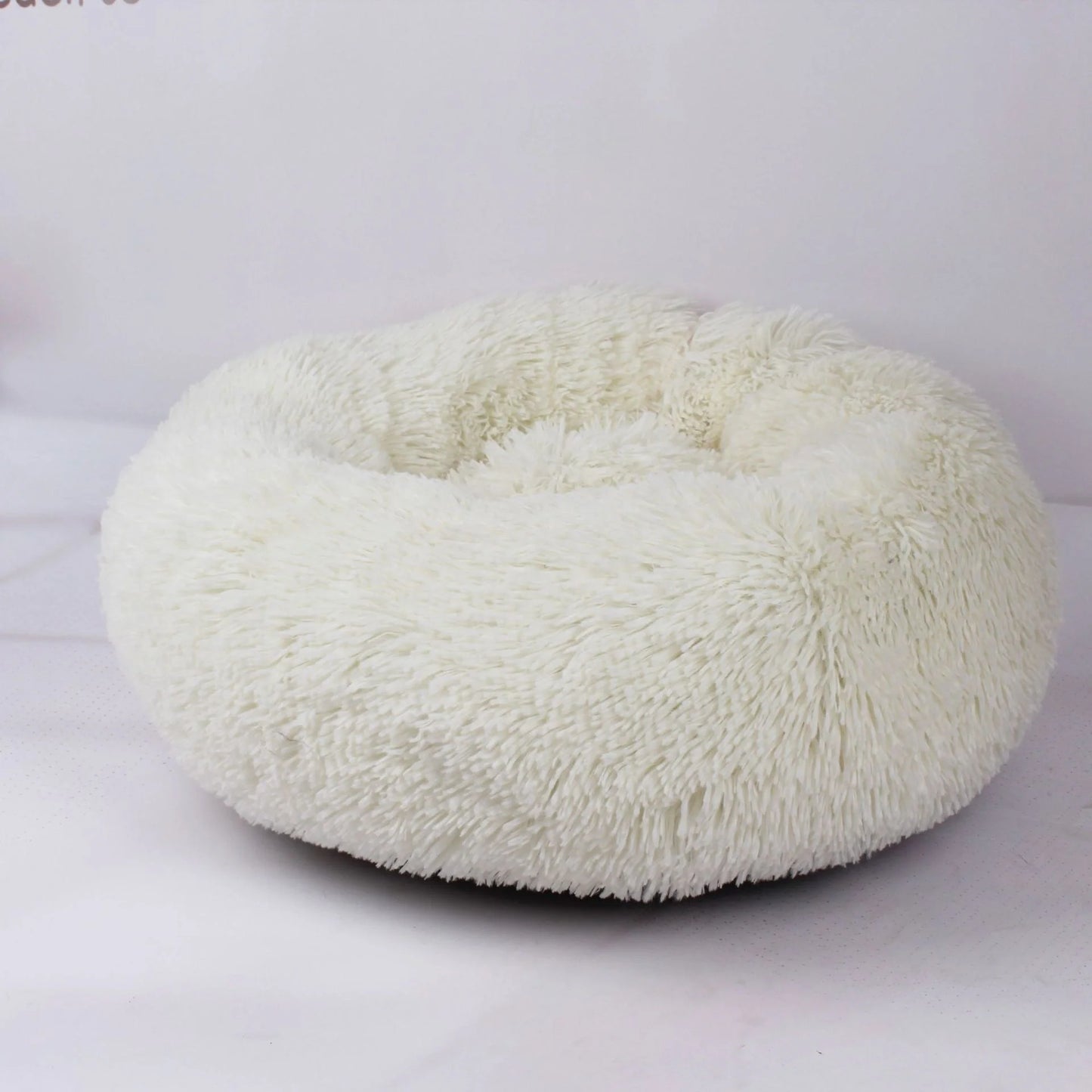 Cosy Plush Pet Nest in various colours and sizes for ultimate pet comfort
