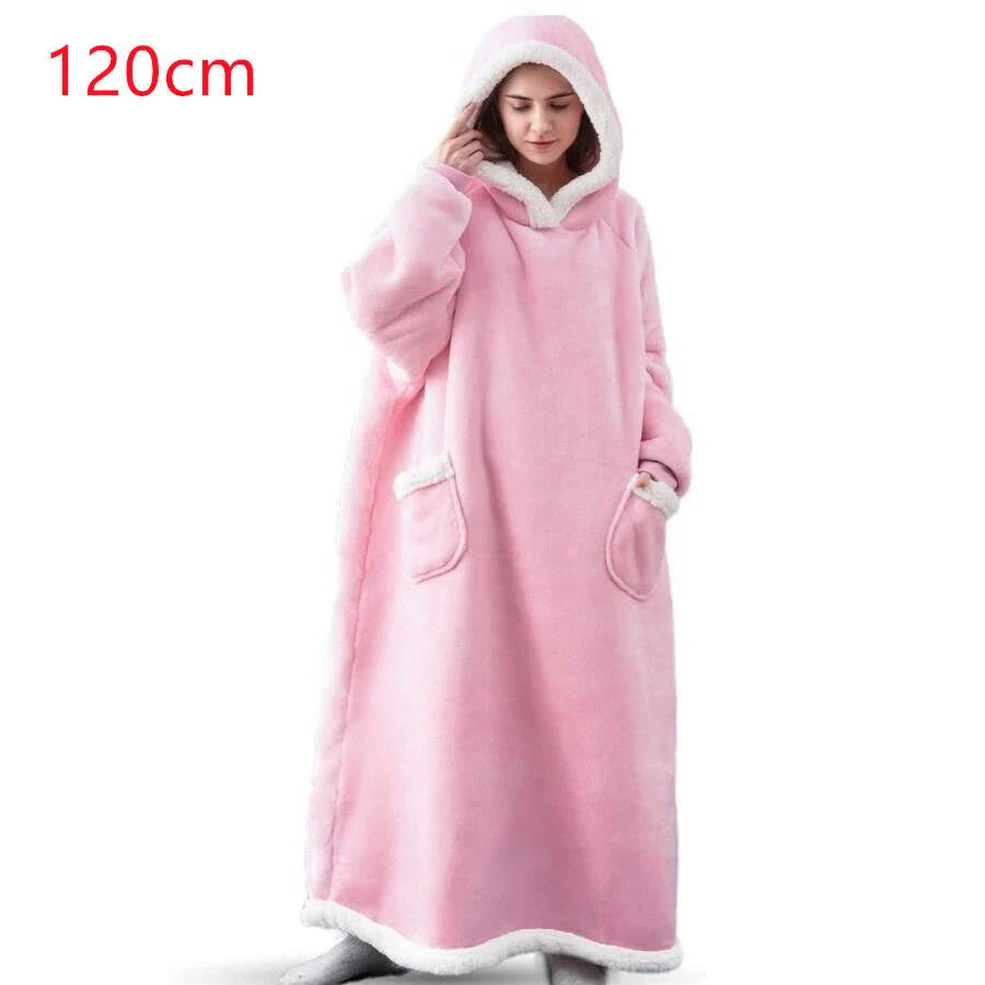Comfy oversized TV hoodie blanket in various stylish colors, perfect for cozy movie nights and relaxation at home.