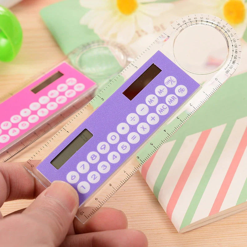 Solar-powered ultra-thin ruler calculator with magnifier function on transparent background