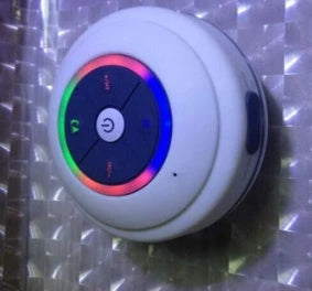 Compact waterproof Bluetooth speaker in various colours, with hands-free calling and premium audio performance