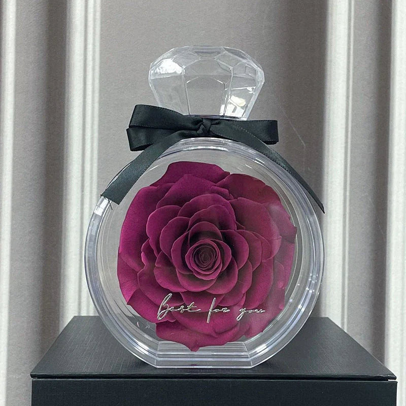 Preserved Rose Flower Ornaments in various colors, including red, pink, plum, and sapphire blue, displayed in a stylish gift box.