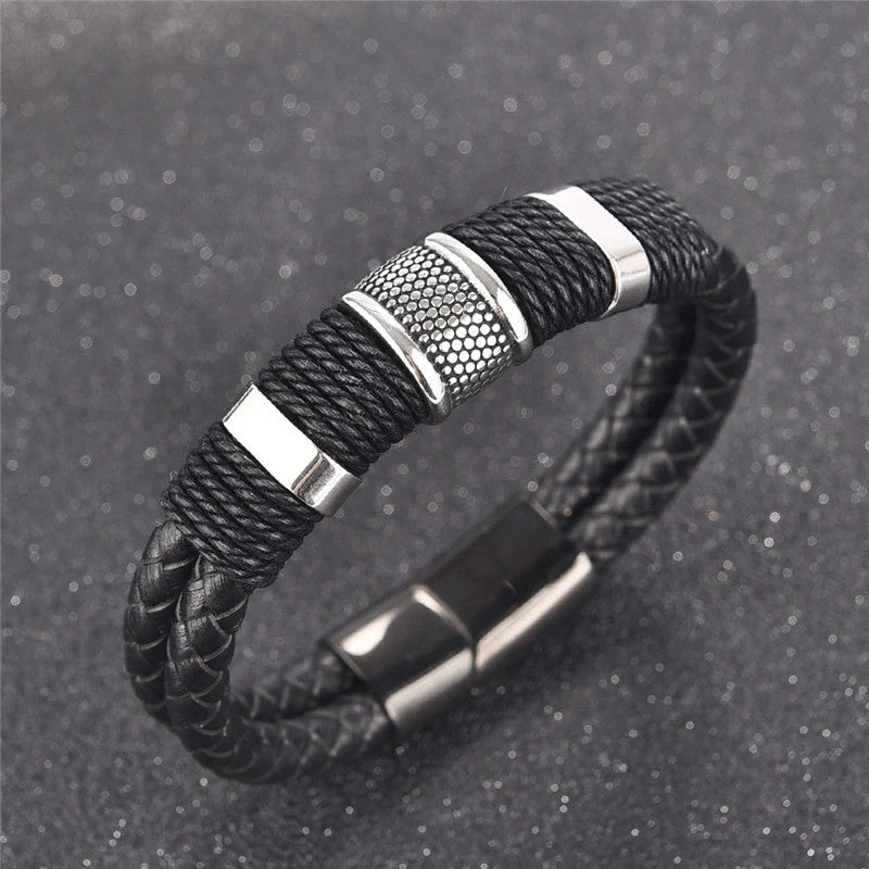 Premium black braided leather bracelet with titanium and stainless steel clasp, a timeless accessory for the modern gentleman