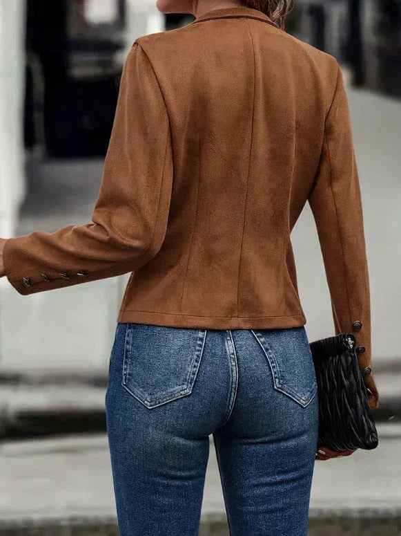 A stylish suede jacket with a double-breasted design, available in dark brown and black colors.