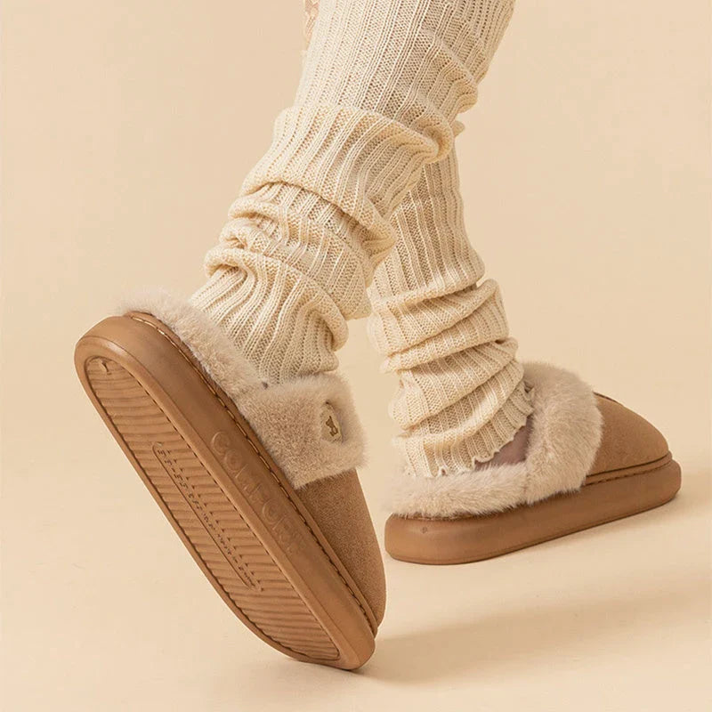 Plush, fleece-lined slippers in a variety of colors for women and men to wear indoors and outdoors