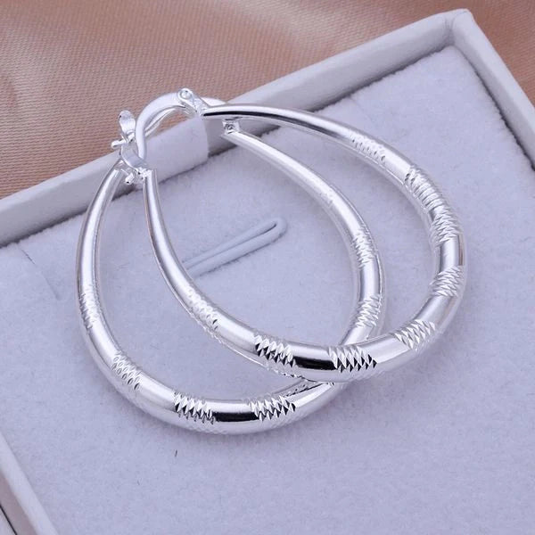Stylish silver hoop earrings with a unique blend of European and American design, crafted from premium copper and 925 sterling silver plating