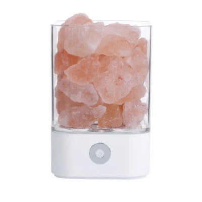 Himalayan salt lamp with warm, amber glow and adjustable lighting settings