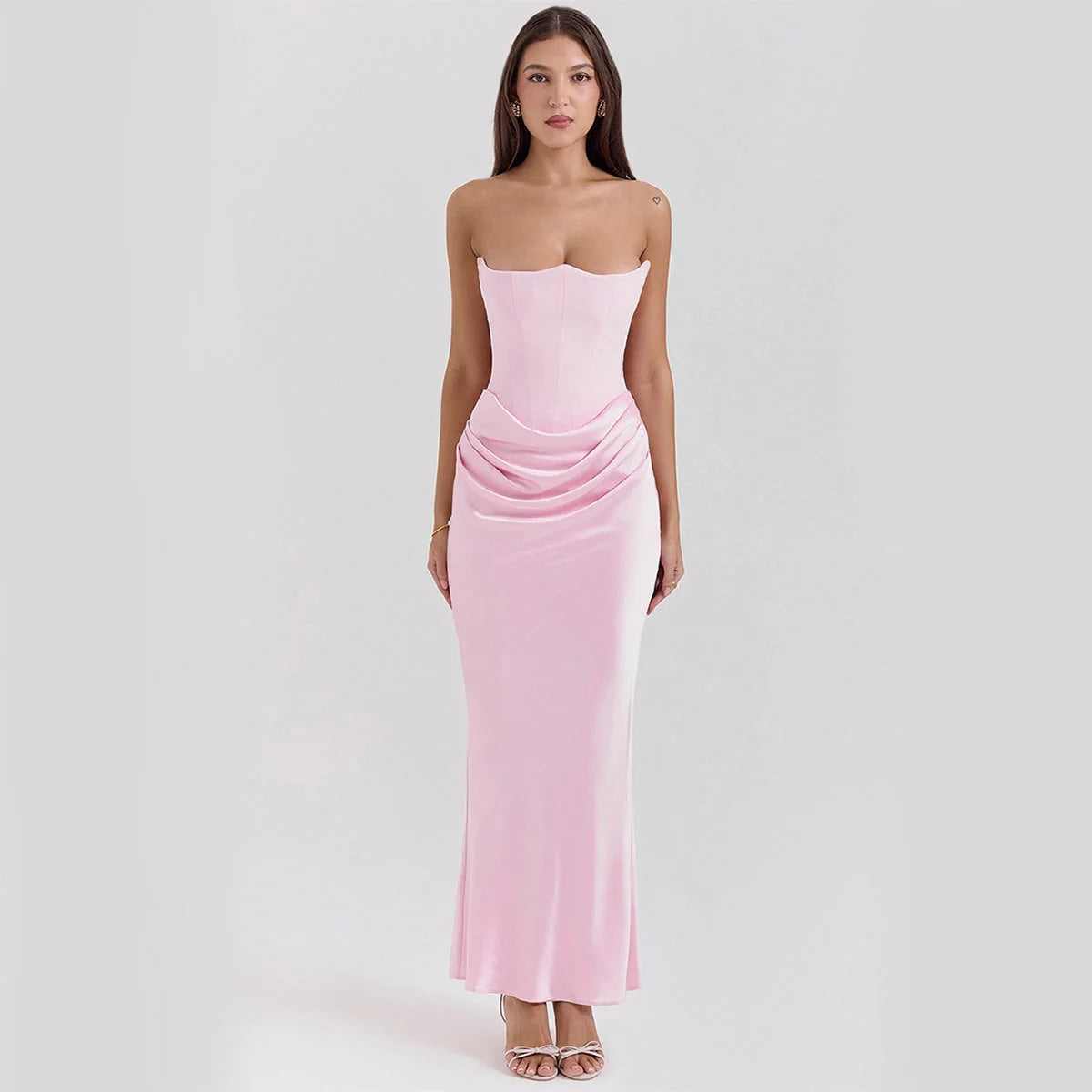 Elegant backless tube top dress in a variety of colours, featuring a sleek and sophisticated design for special occasions