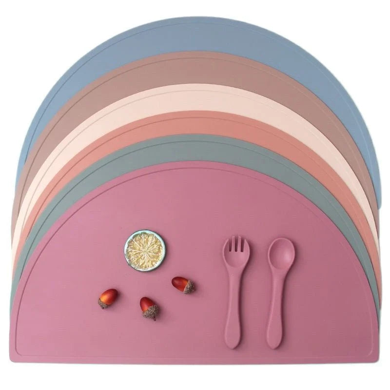 Durable silicone placemat in various colors, featuring waterproof and stain-resistant properties for easy cleaning