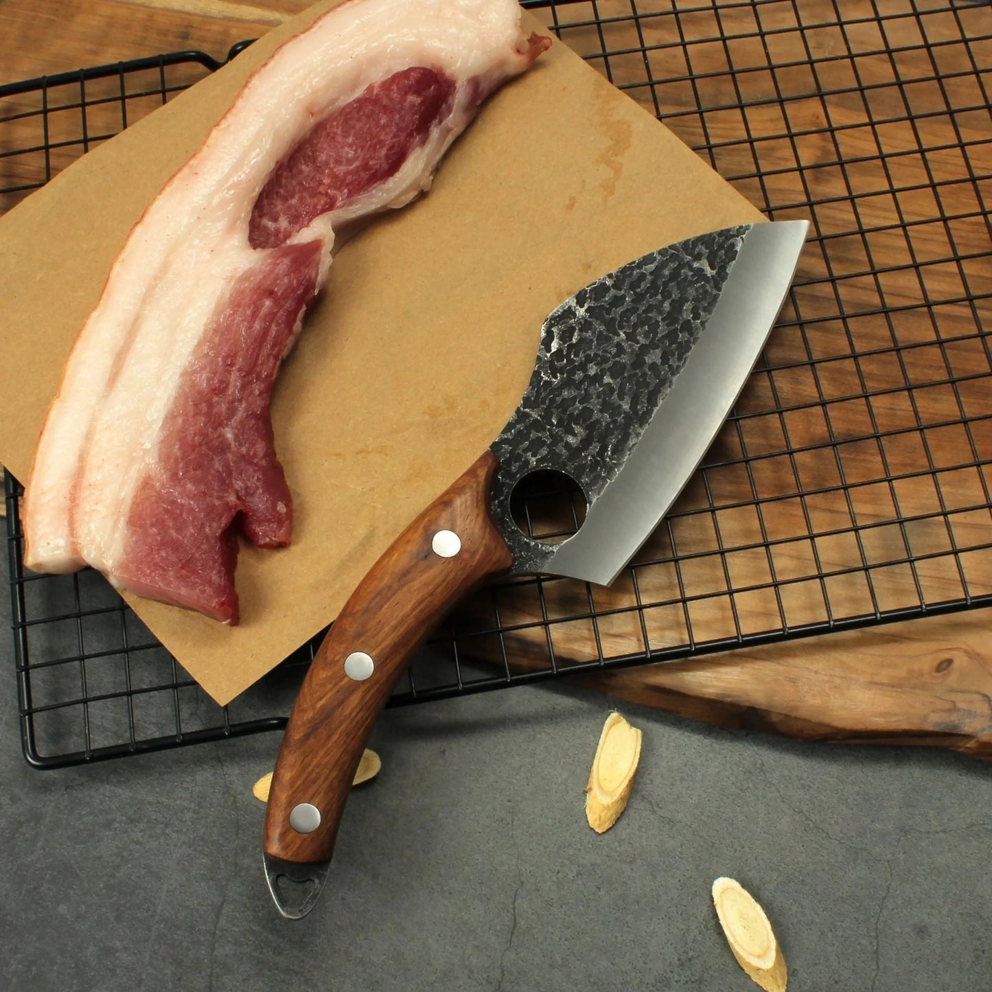 Forged stainless steel boning knife with ergonomic handle and leather sheath