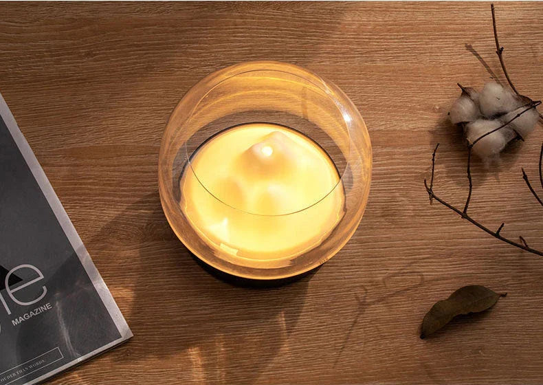 Premium aroma diffuser with serene mountain landscape design and multi-coloured night light for relaxation and well-being