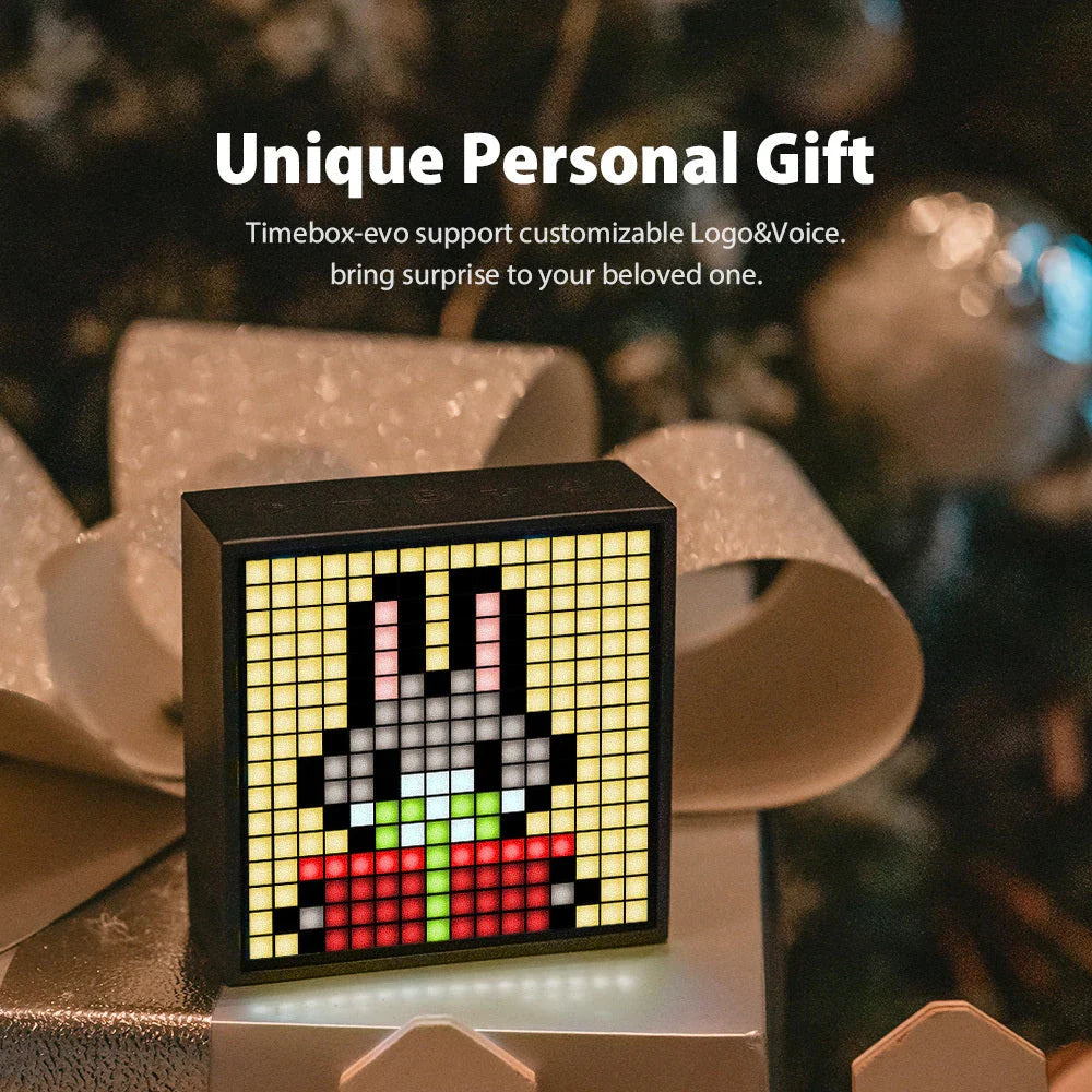 Bluetooth speaker with programmable LED display for pixel art creation, alarm clock, and DJ sound effects