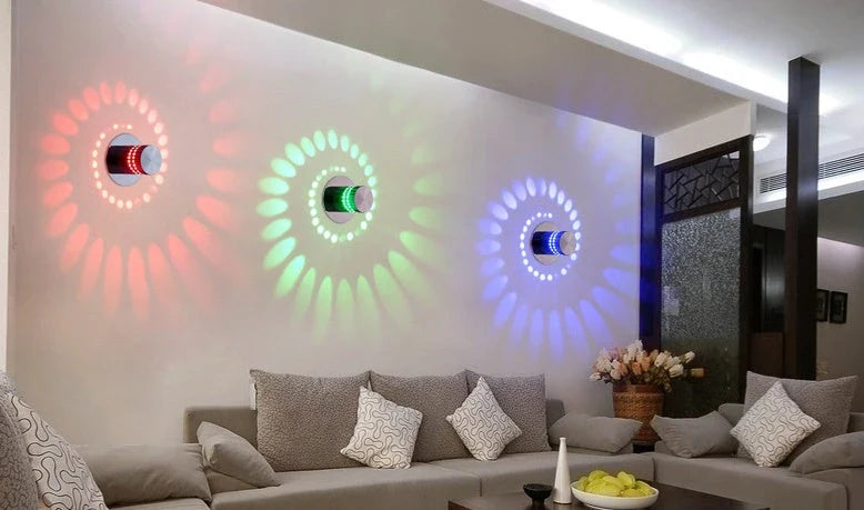 Colorful LED wall lights with a spiral design, featuring a wireless remote control for adjusting the vibrant color-changing display.