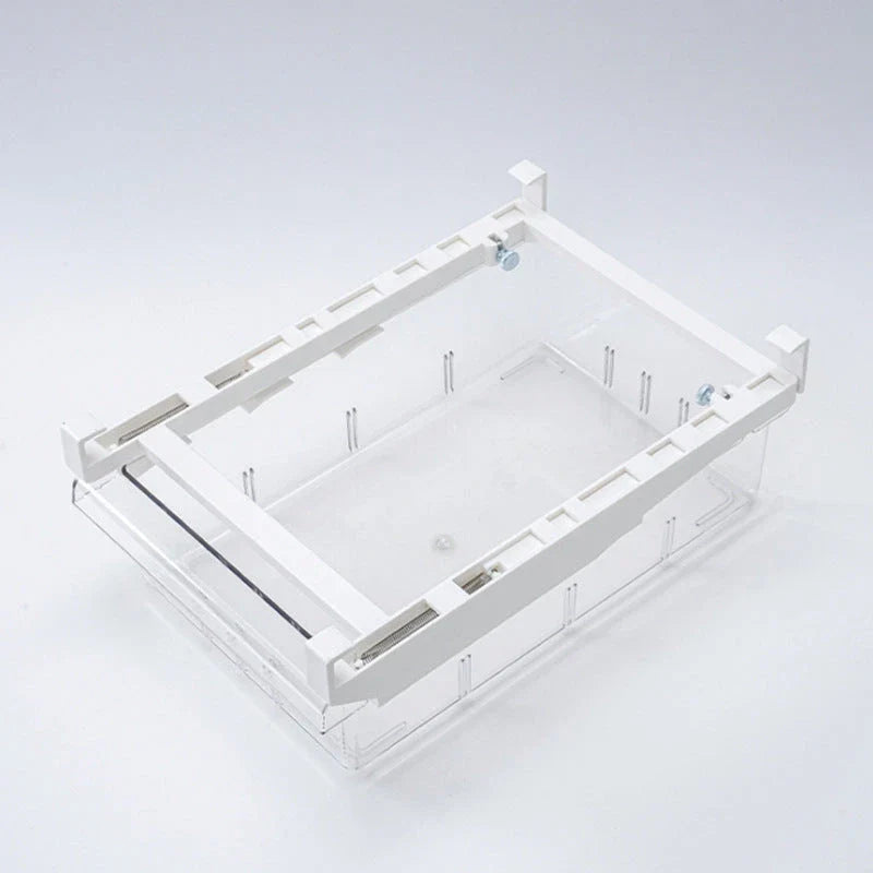 Transparent rectangular storage box with modular grid system for organised storage in kitchen or office