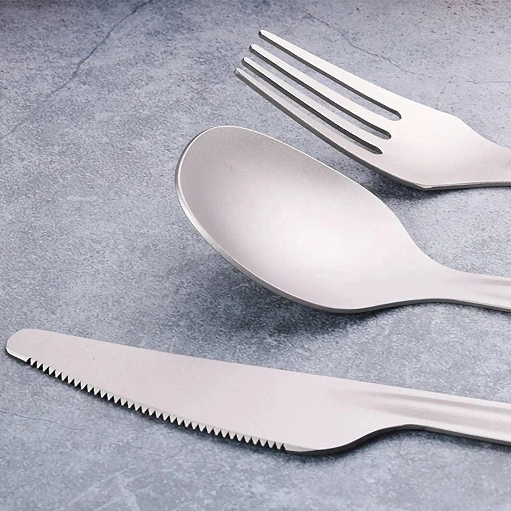 Titanium 4-in-1 outdoor cutlery set with multifunctional holder for camping, hiking, and picnics