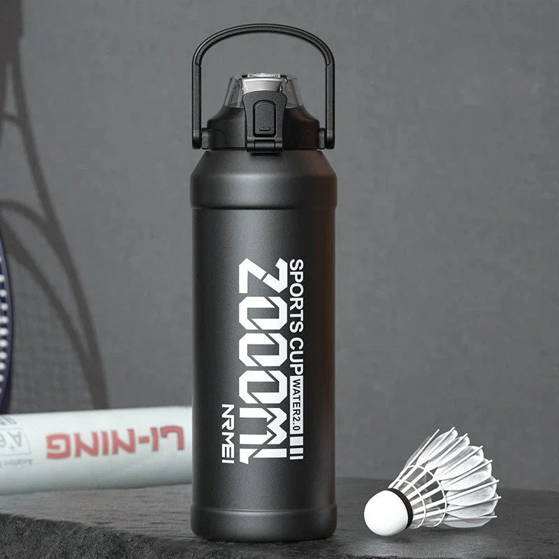 Insulated stainless steel water bottle with removable straw, designed for hydration and convenience in the UK
