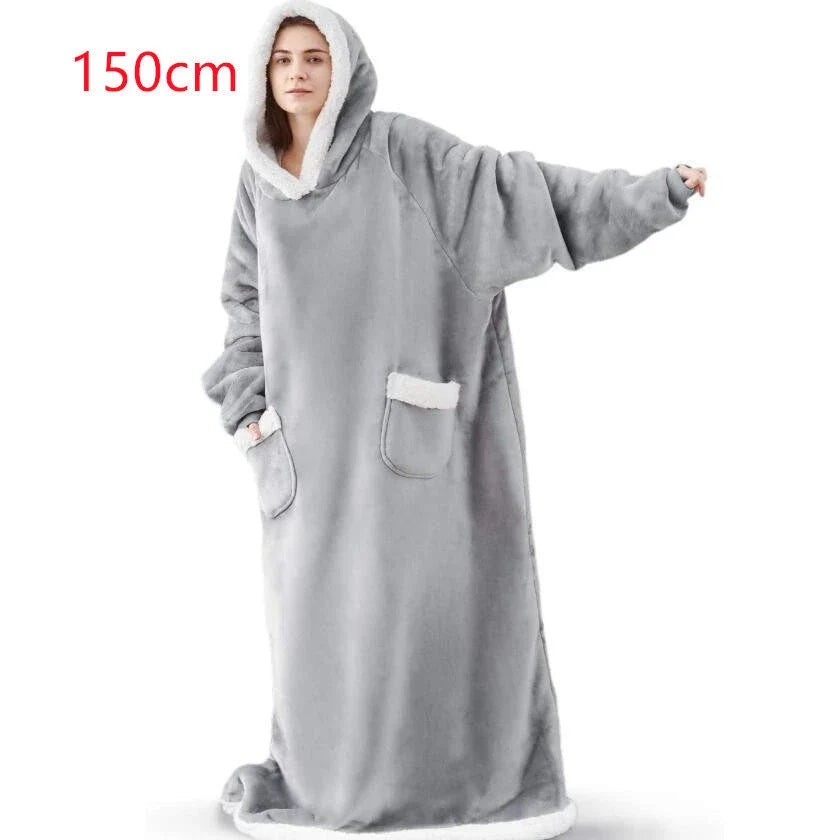 Comfy oversized TV hoodie blanket in various stylish colors, perfect for cozy movie nights and relaxation at home.