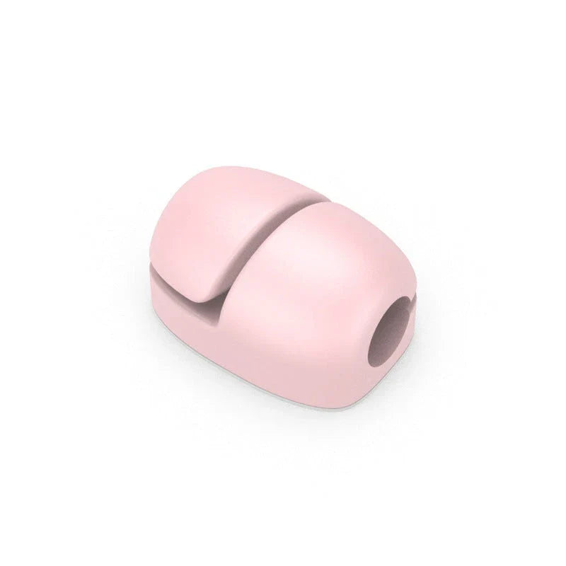 Premium silicone cable clips in various colours for organising and managing cables on desks, entertainment units, and other surfaces