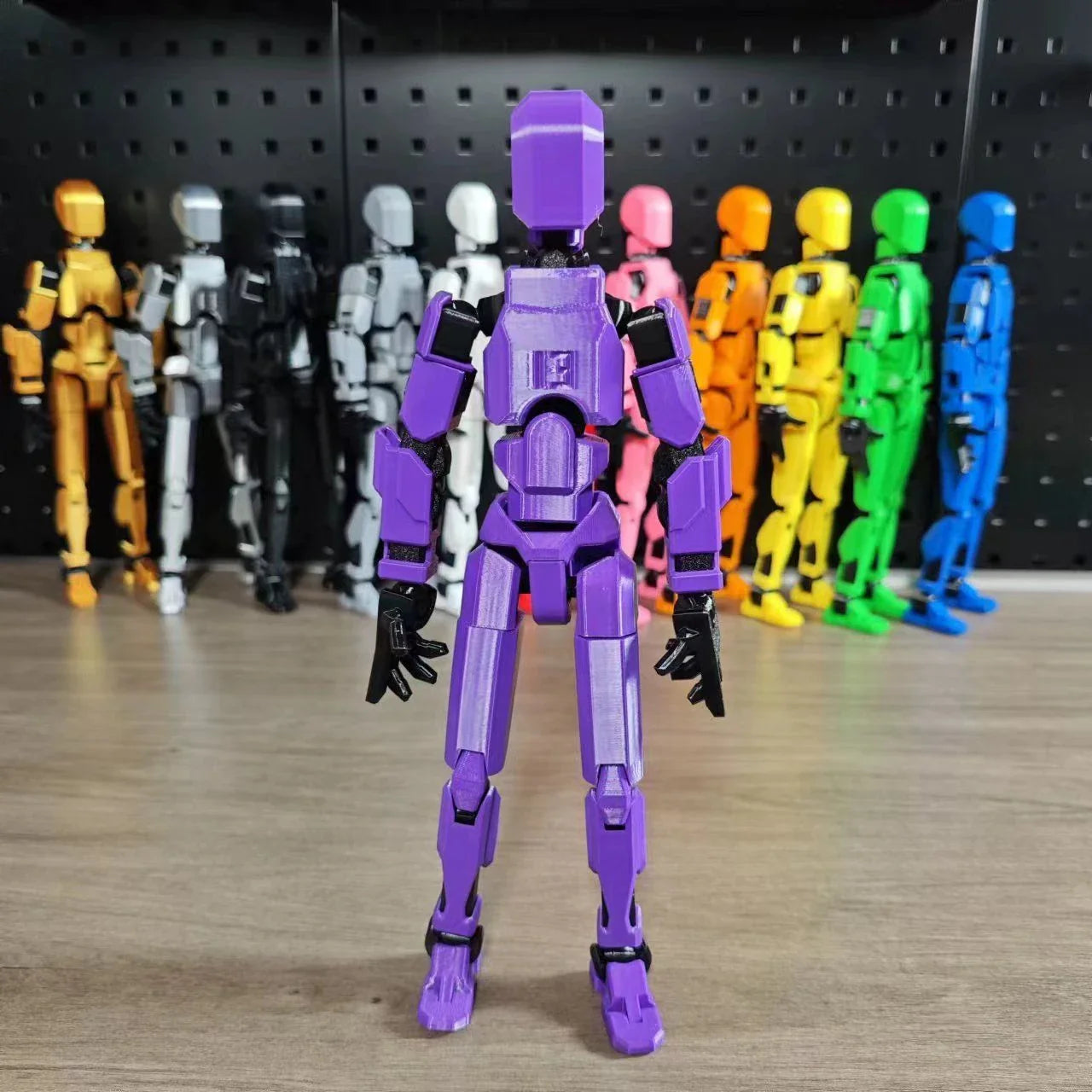Poseable 3D-printed transforming robot action figure toy in various bright colors