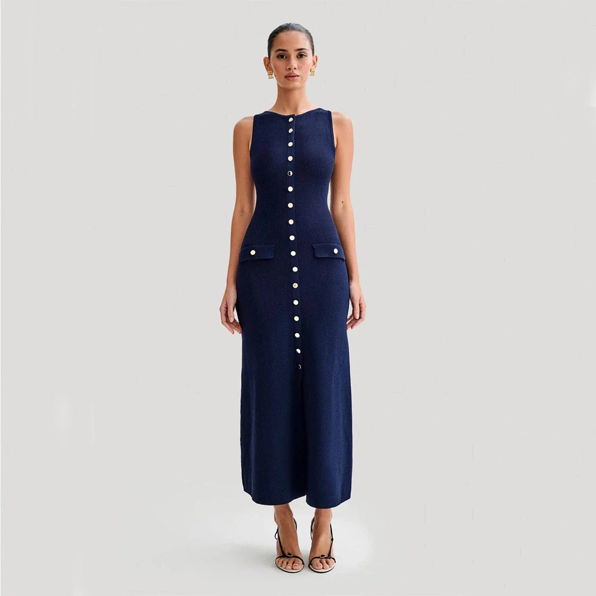 Sophisticated knit sleeveless dress with a slim, figure-flattering silhouette in apricot and blue colors