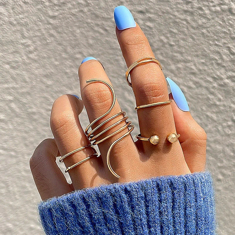 Stylish retro wave open ring in gold, perfect for elevating any outfit