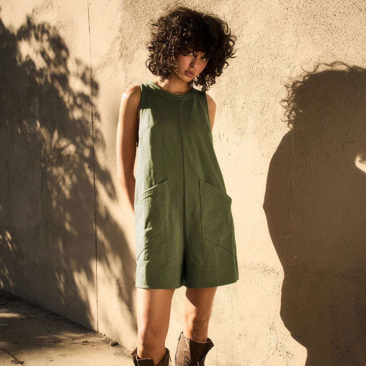 Stylish and comfortable cargo jumpsuit with pockets in various colors, including coffee, dark grey, army green, black, beige, and rose red.