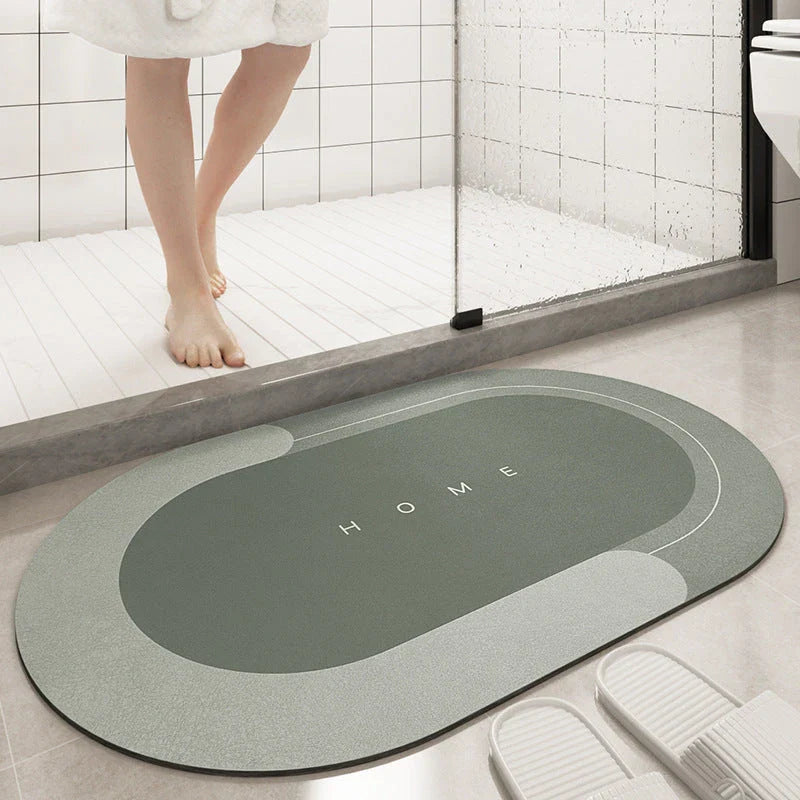 Plush, machine-woven bathroom mat with non-slip surface, available in rectangle and oval shapes in a variety of colours.