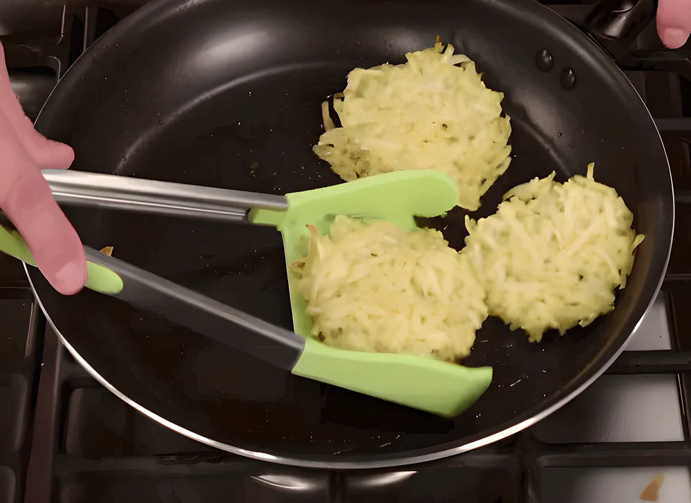 Versatile 2-in-1 kitchen tongs with spatula in green and red colours, designed for seamless cooking and serving tasks
