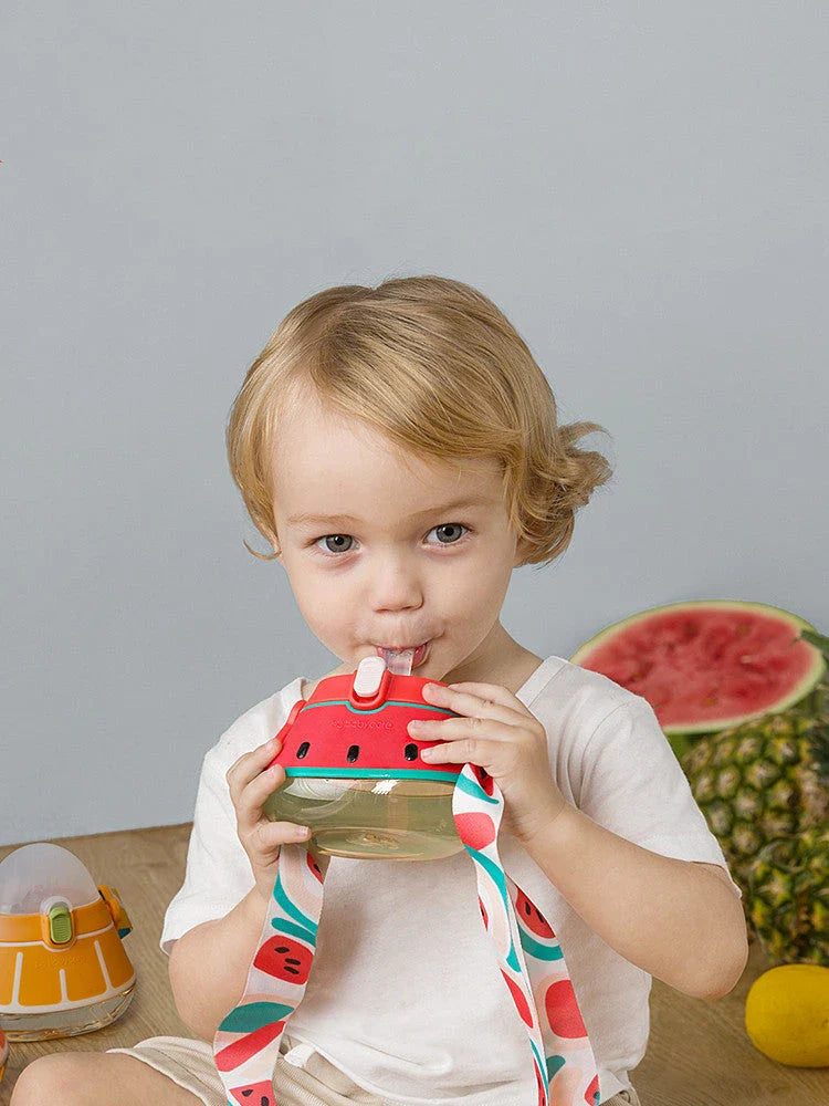 A colourful, spill-proof children's drinking cup with a silicone straw, designed for easy and mess-free hydration on the go.
