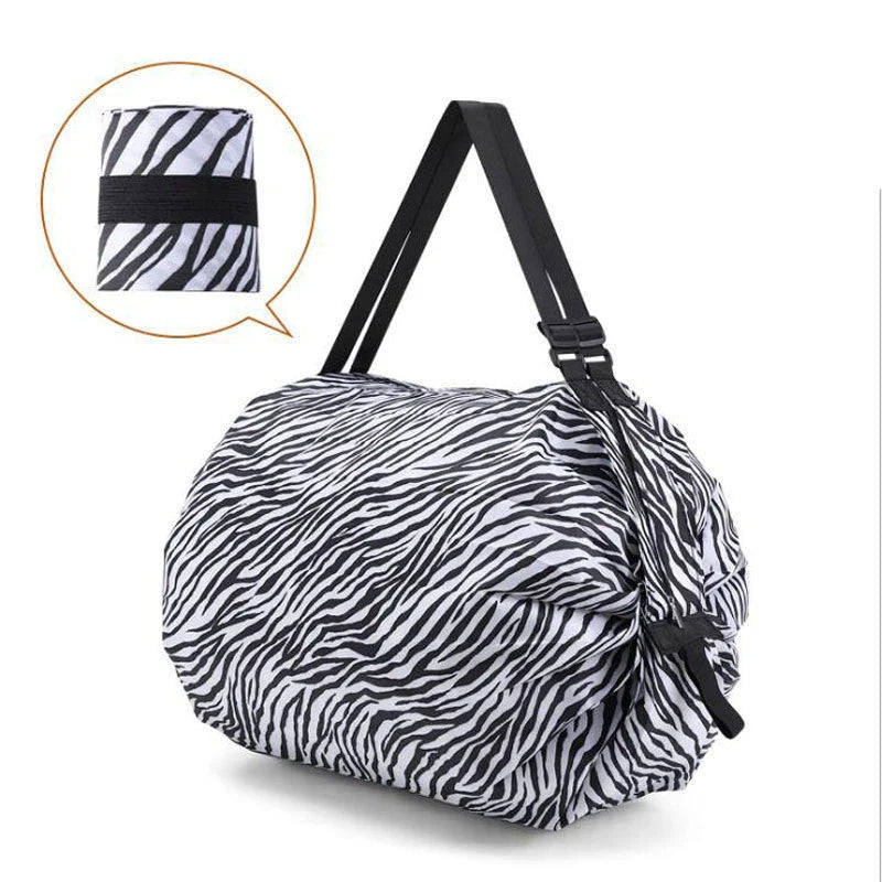 Foldable tote bag made of durable 210D Oxford cloth, featuring a roomy storage space and various stylish color options for on-the-go organization and convenience.