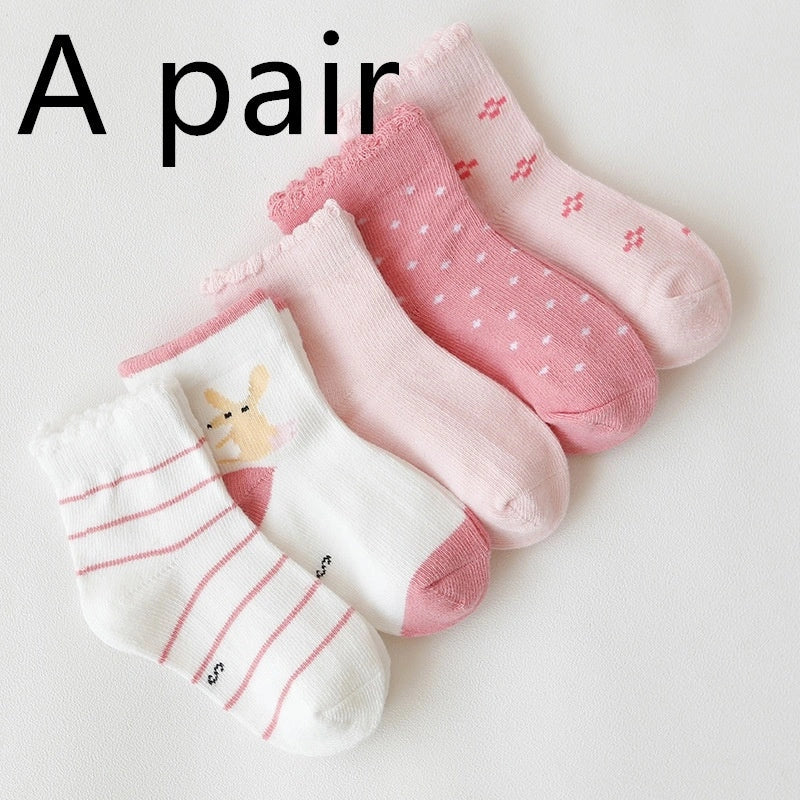 Kids' cartoon jacquard cotton socks in various fun designs for comfort and style