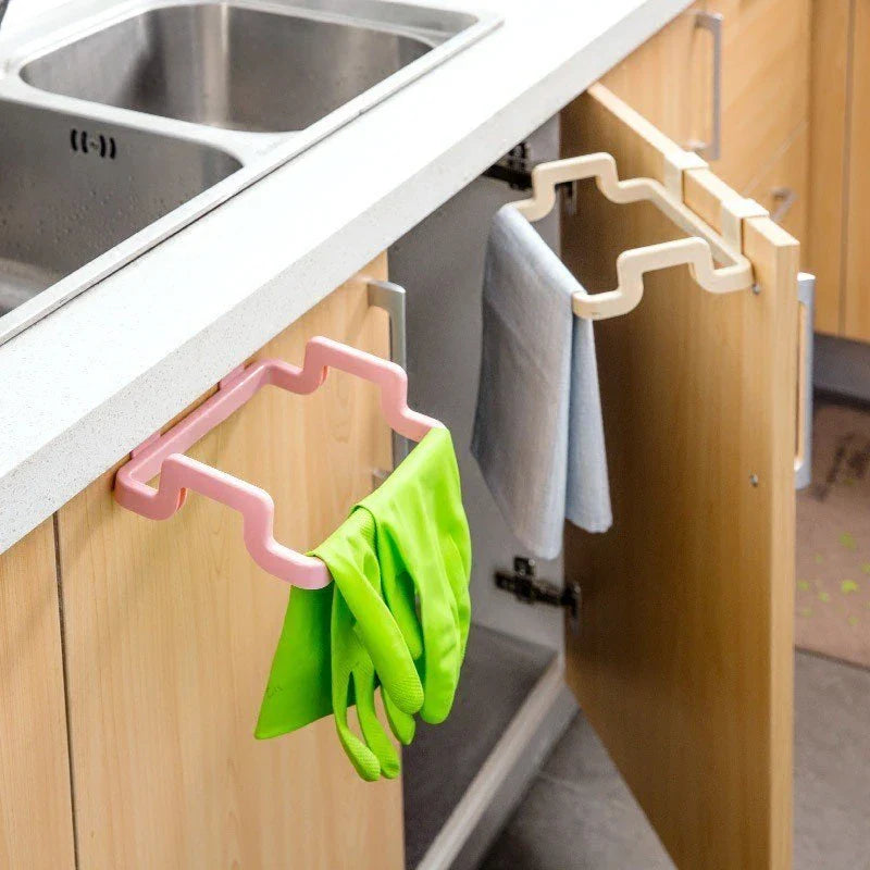 Versatile kitchen storage caddy that hangs discreetly behind cabinet doors, available in a variety of vibrant colours
