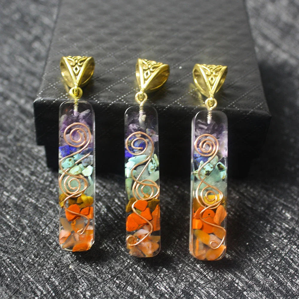 A stunning chakra crystal pendant with natural patterns and organic imperfections, showcasing the beauty of nature.