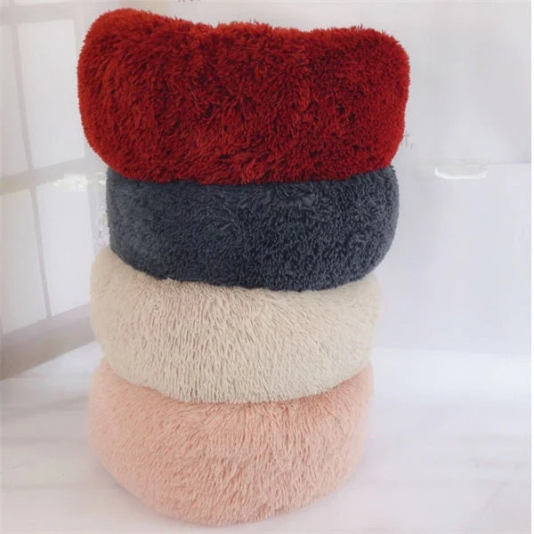 Cosy round plush cat mattress for winter warmth, available in various colours and sizes