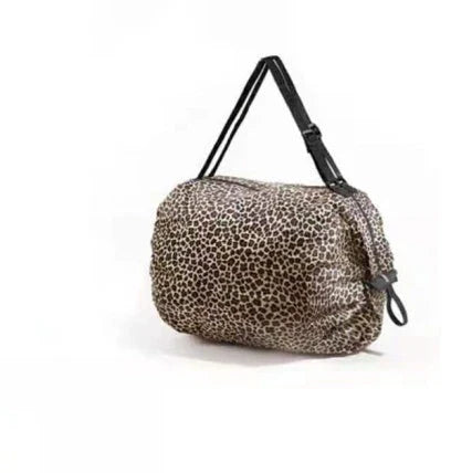 Foldable tote bag made of durable 210D Oxford cloth, featuring a roomy storage space and various stylish color options for on-the-go organization and convenience.