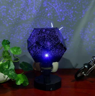 Magical Starlight Projection Lamp casting a mesmerising display of stars and seasonal motifs, creating a serene ambiance in a living room
