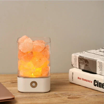 Himalayan salt lamp with warm, amber glow and adjustable lighting settings