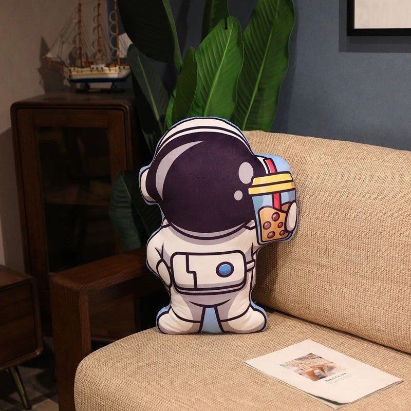 Soft, plush pillows in the shape of astronauts, rockets, and spacecraft to captivate young space enthusiasts