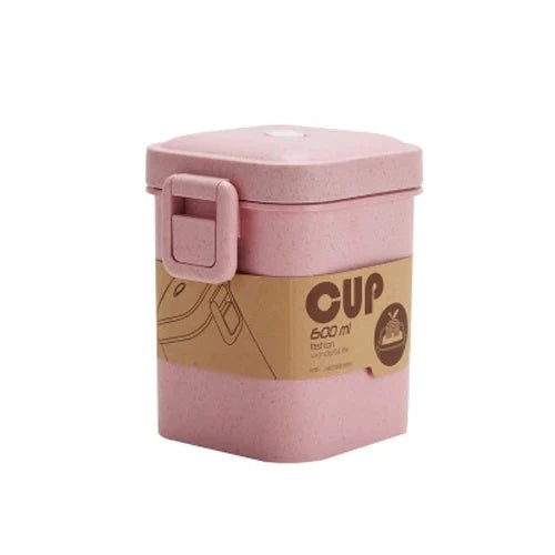 A stylish microwave-safe lunch box with a removable soup mug in various colours, including pink, green, and apricot