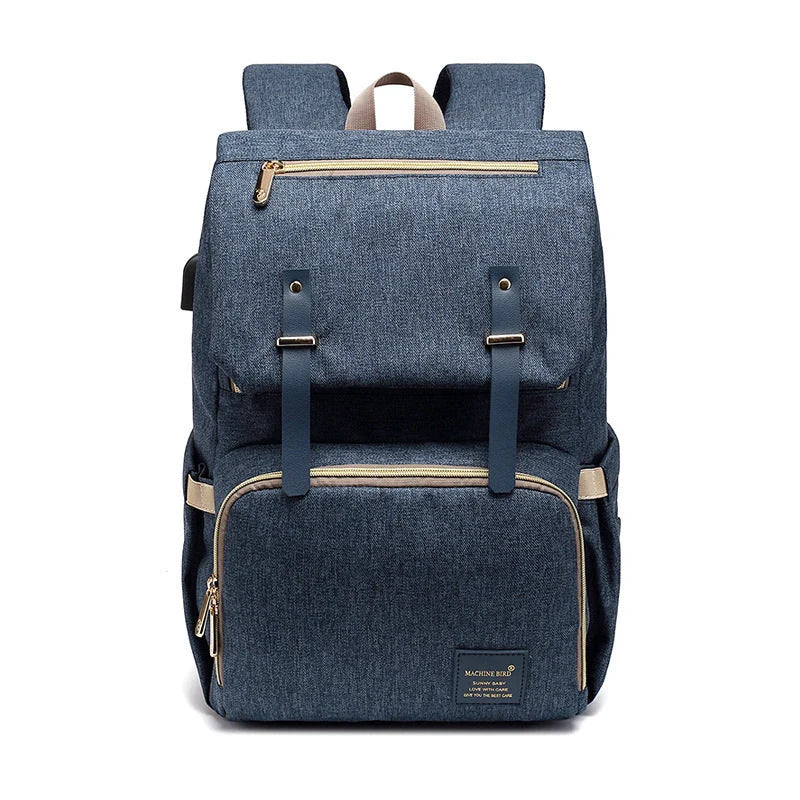 Versatile mummy bag with stroller hooks, side pockets, and zippered compartments for storing baby essentials