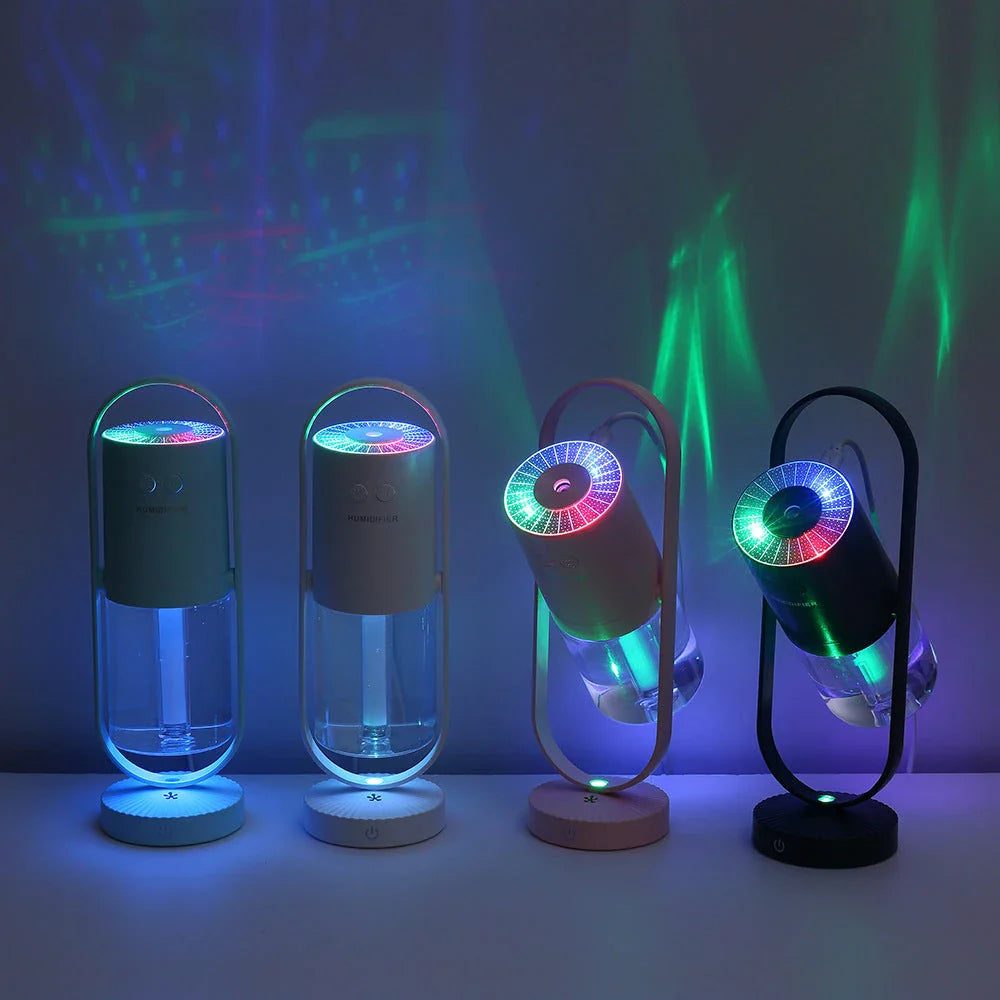 Compact USB Powered Desktop Humidifier with Ambient Lighting, featuring adjustable mist nozzle and romantic starry projection