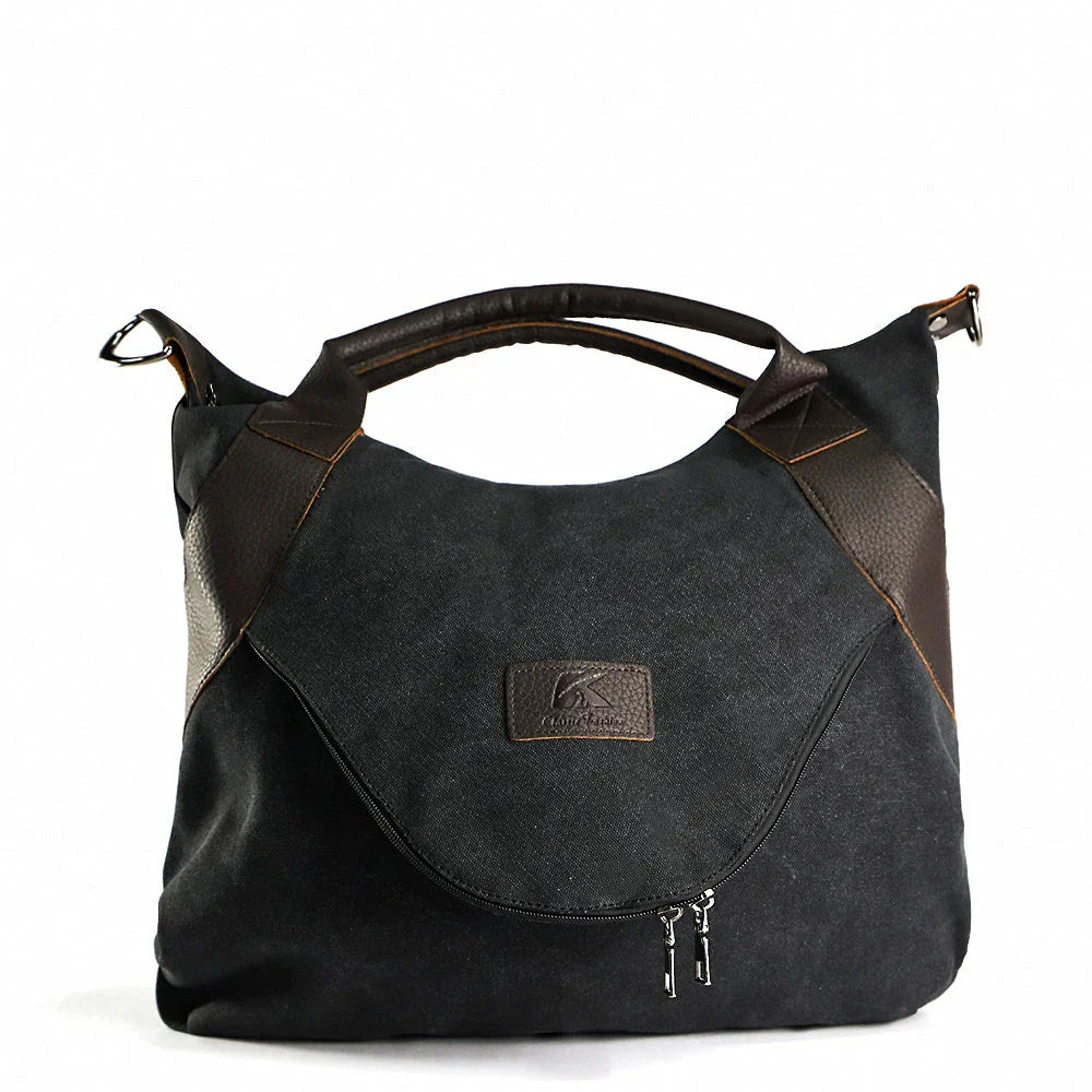 Stylish and versatile canvas shoulder bag with premium brass hardware and thoughtful interior organisation