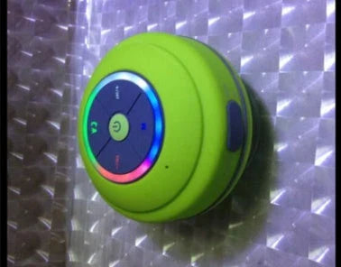 Compact waterproof Bluetooth speaker in various colours, with hands-free calling and premium audio performance